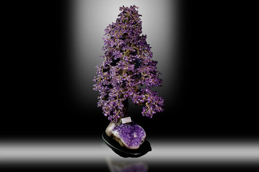 An image showing an Authentic Amethyst Crystal Tree standing 65 inches tall.